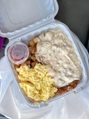 Chicken fried steak with scrambled eggs