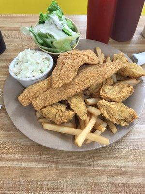 The #42 6 oyster with 2 fish and french fries  Sides coleslaw and salad