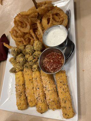 Appetizer platter- stuffed mushrooms, mozzarella sticks, and shoestring style onion rings