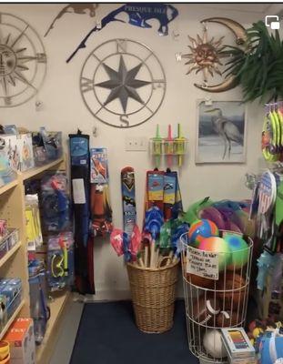 Beach accessories, pails, shovels, rafts, balls, kites and toys