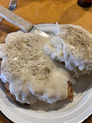 Huge!!! Chicken Fried steak with white gravy and Mashed potatoes.