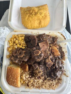 Large oxtail, rice and peas, cornbread and a beef pie