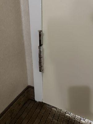 Nail sticking up out of door