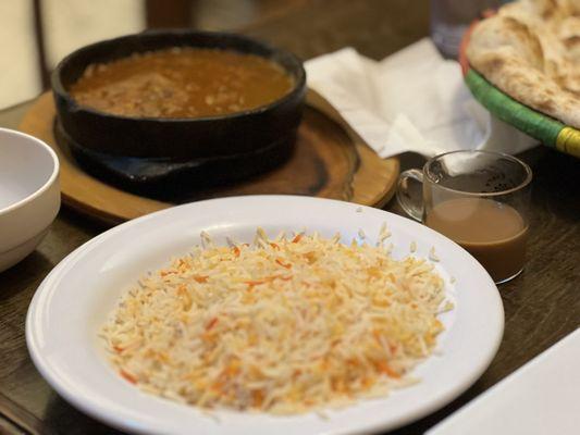 Rice, lamb fahsa in background