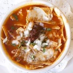 Sopa de tortilla with onions, spice, cilantro