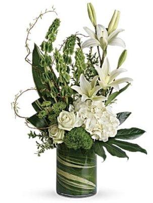 Botanical Beauty is our TOP seller of 2021! Nothing beats a clean white arrangement.