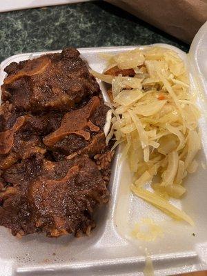 Oxtail with a side of cabbage and plantain