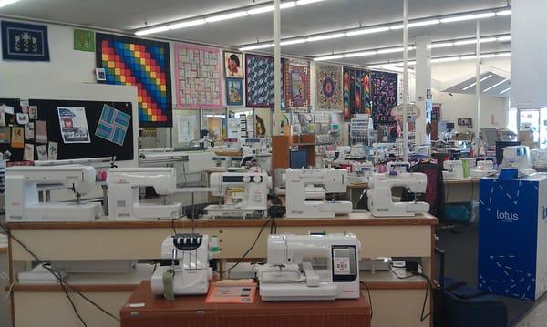 Enough sewing machines to open your own sweat shop!  High tech one too-