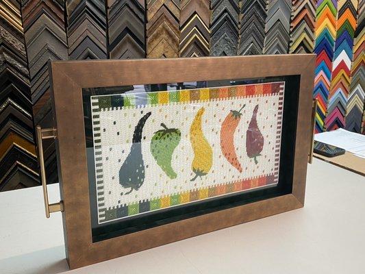 Turn your needlepoint or cross-stitch masterpiece into a custom tray.