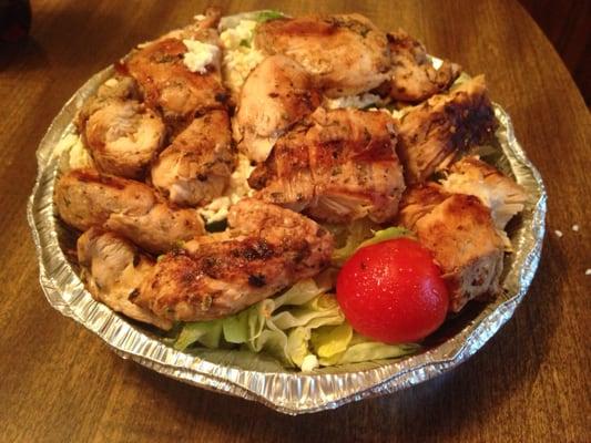 Generous portion of decent grilled chicken. Underneath the chicken, however, is basically a big pile of iceberg lettuce and one tomato.