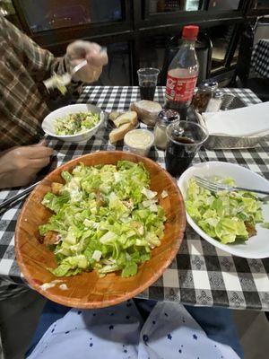 Huge delicious Caesar salad, Italian bread and butter.