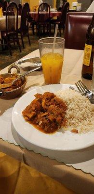 Chicken vindaloo with mango juice.