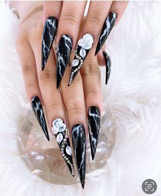 Stiletto tips with hand-sculpted 3D flower and marble design