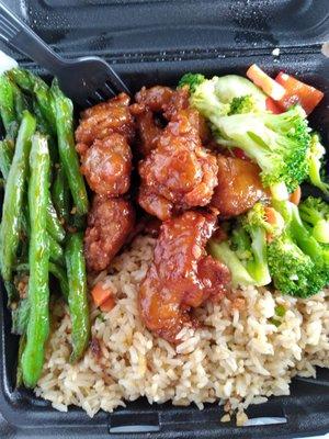 Honey Chicken with stir fry vehetable rice. Mixed vegetables and green beans