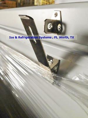 These are hasps, not the "locking bar" Alamo Refrig claims they have. Thank you Ice & Refrig for the photos.