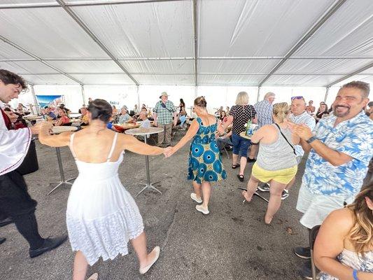 The Greek dancing troupe getting the audience up to dance