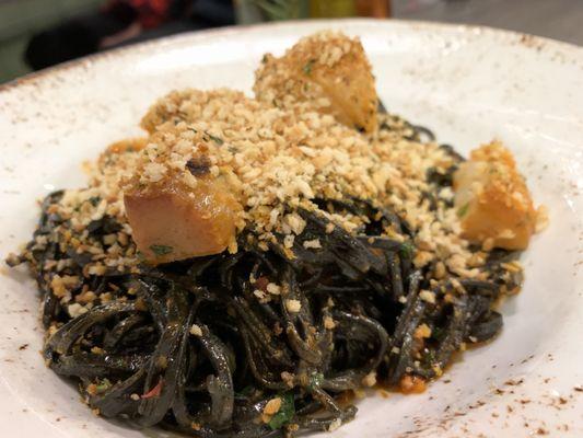 Squid ink pasta with scallops