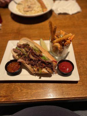 Philly cheesesteak with a la carte fries