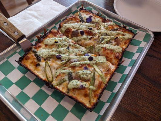 Featured Pizza (New Potatoes, Asparagus, Green Goddess Dressing, Edible Flower Petals)