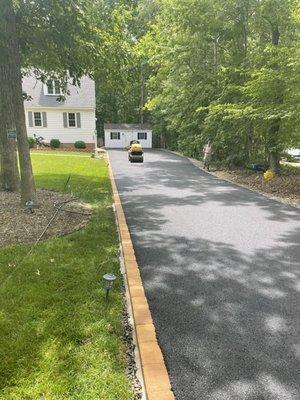 New asphalt drive with Hardscape border