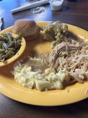 Turkey, mashed potatoes, stuffing, green beans and gravy.  Today's special under 11.00.