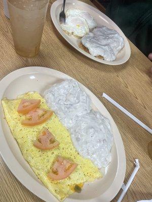 Western omelet and eggs with biscuits and gravy.