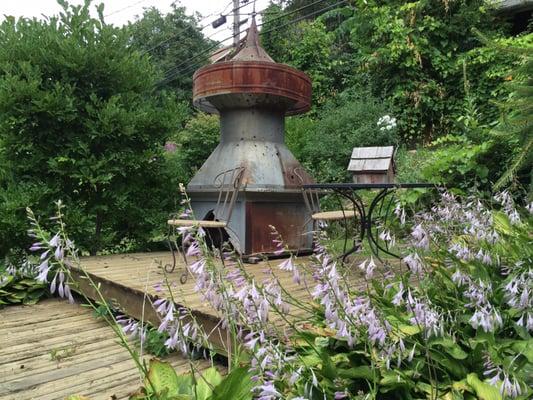 Journey to the top of the garden to find this place to relax and enjoy a wonderful cappuccino!