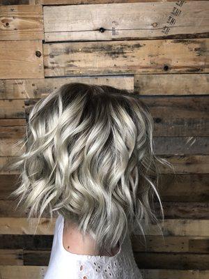 Icy blonde with a shadow root & trim