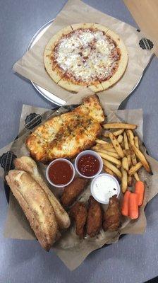 Appetizer platter and cauliflower pizza