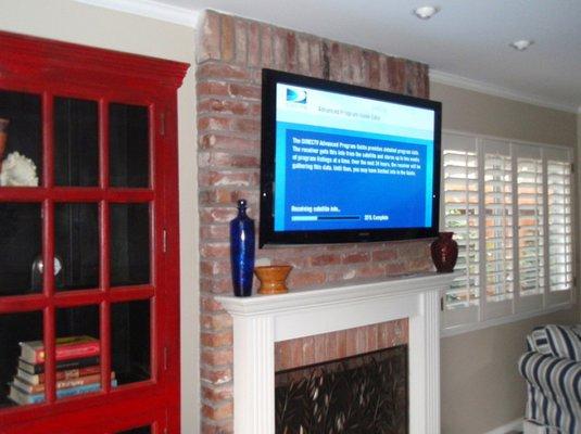 Brick Fireplace Mounted TV