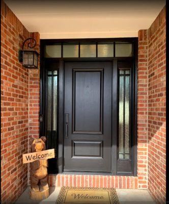 Solid black front door