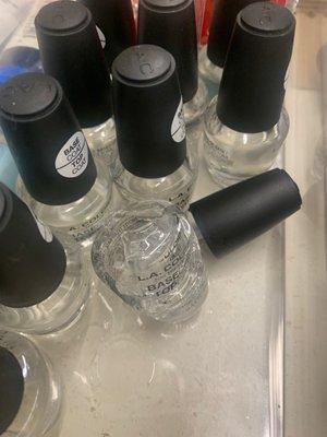 Broken nail polish bottle