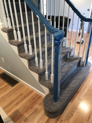 One of a kind set of steps open on both sides Hollywood style with spindles installed by Michael Lincoln from Floors and Kitchens Today