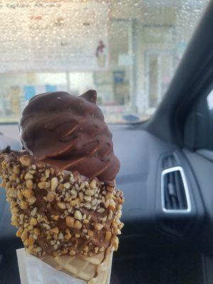 Chocolate dip twist in a homemade chocolate-dipped waffle cone with nuts