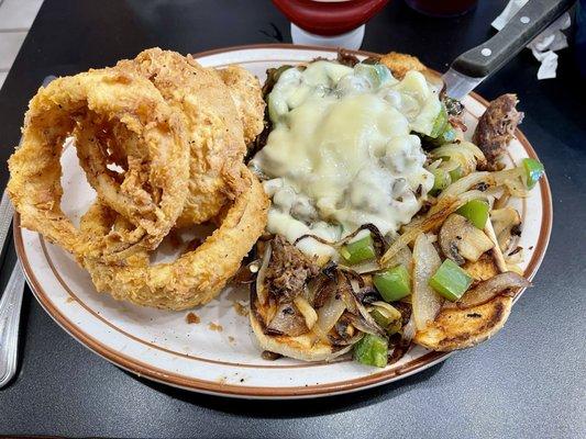 Cheesesteak sandwich with Onion Rings