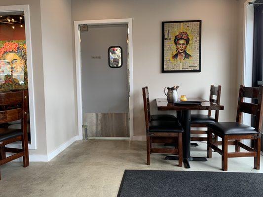 Kitchen door and seating area.