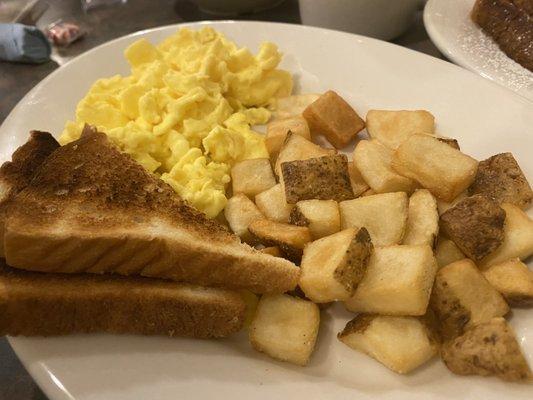 Scrambled eggs, hash and toast