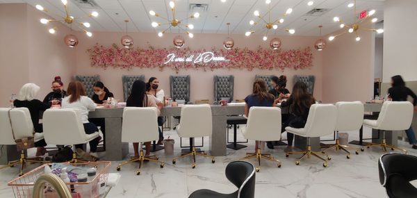 The nail area is in the middle and each side of the room has pedicure chairs.