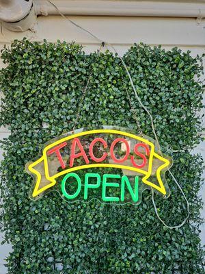 Tacos open sign