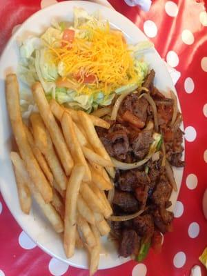 Steak Milanesa with fries/salad.  You can also get with rice/beans. $10.75, enough to get stuffed