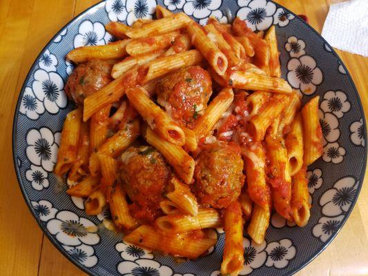 Penne with meatballs.