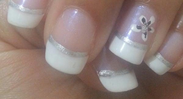 SLOPPY. look at the bottom nail. The line is off and she painted over lint on my other nail