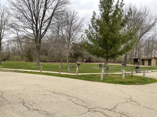 Restrooms and some picnic areas, with the trail in the distance.