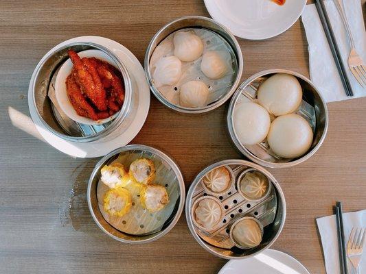 Lava custar bun, xiao long bao, siu mai, har gow, chicken feet