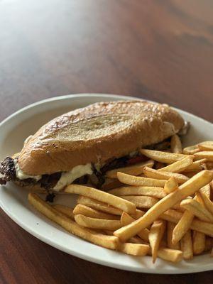 Philly Cheese Steak and fries. Wonderful, tasty, and very filling! The staff is very welcoming and friendly.