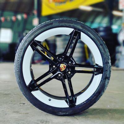 Porsche Taycan wheel wrapped with Continental Tires