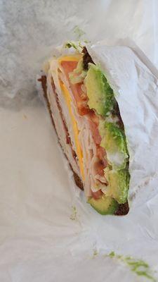 Big portion. Average sandwich. #4 added avocado & american cheese. Try Huckleberry's famous sandwich instead (also in HB)