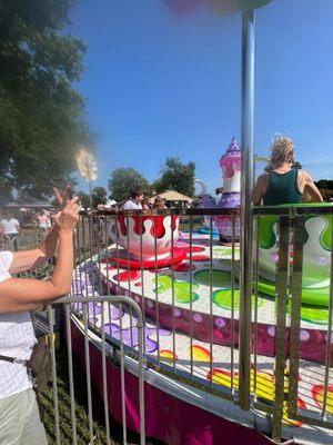 Tea Cup Ride - son's favorite ride ** loved that on their's it had the fencing on the ride, instead of movable ground fencing