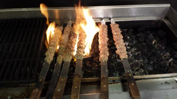 Persian koobideh kabob cooked the traditional way over charcoal. Half ground lamb and half ground beef.