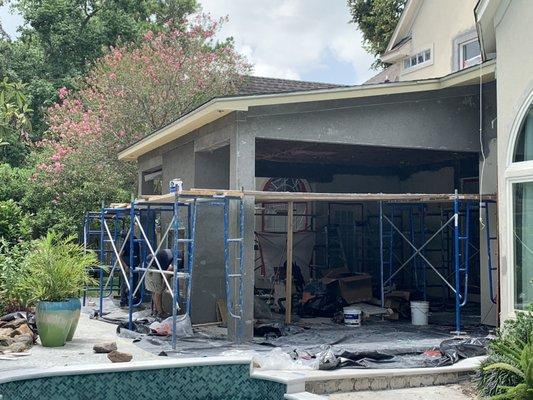 Stucco application on an outdoor kitchen extension